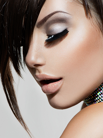 Editorial portrait with a dark smoky eye and a full lash set